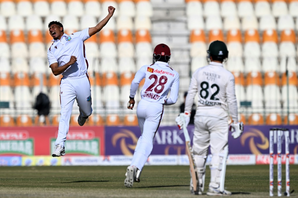 Gudakesh Motie celebrates taking the wicket of Kamran Ghulam in Multan, AFP