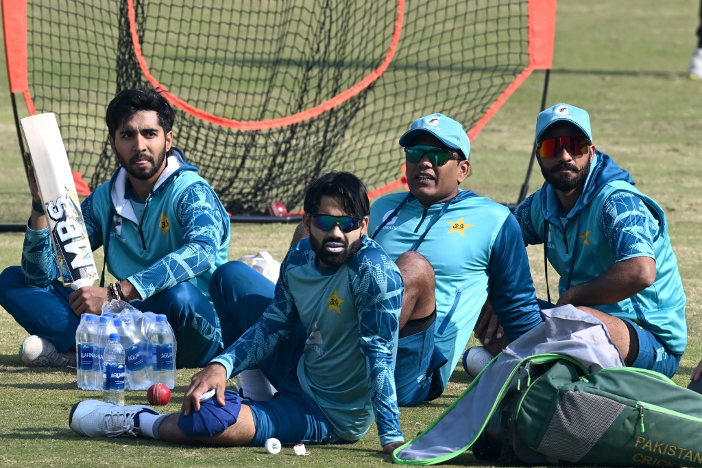 Pakistan players Sajid Khan (R), Noman Ali (2R) and Mohammad Rizwan (2L) attend a practice session before the first Test against West Indies in Multan, AFP