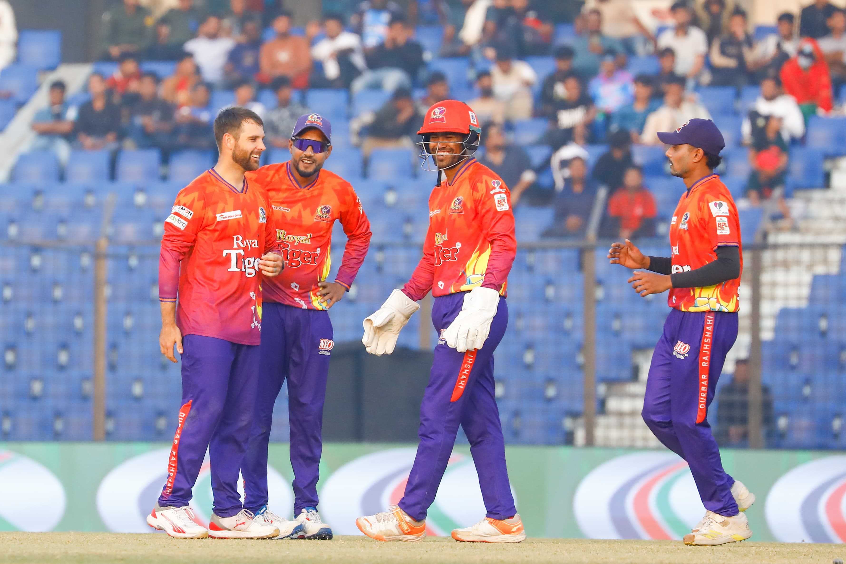 Durbar Rajshahi's Zimbabwe player Ryan Burl with teammates, Cricfrenzy