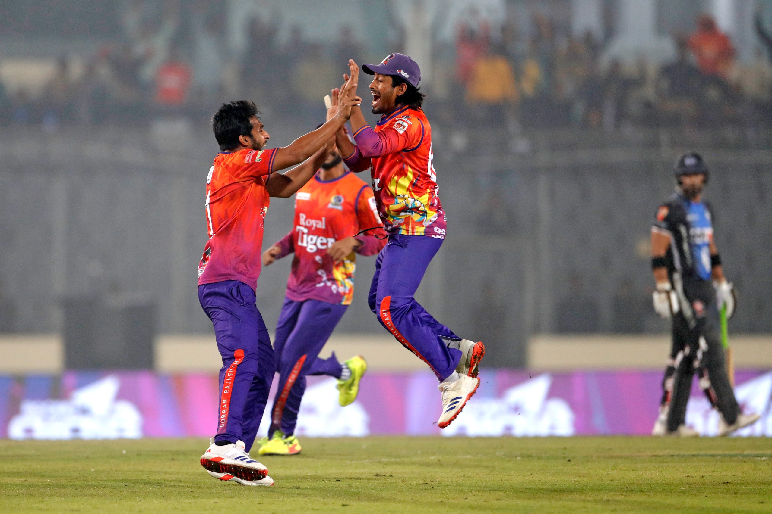 Mrittunjoy Chowdhury celebrates one wicket of his four wickets with teammates, Cricfrenzy