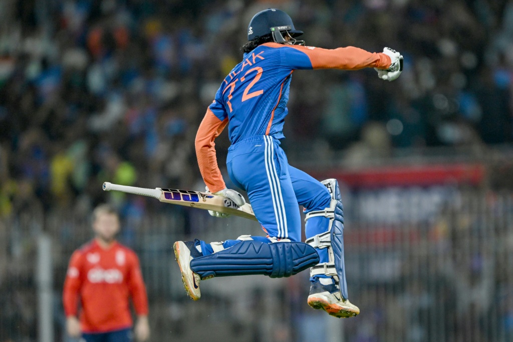 India's Tilak Varma celebrates his 72 not out, AFP