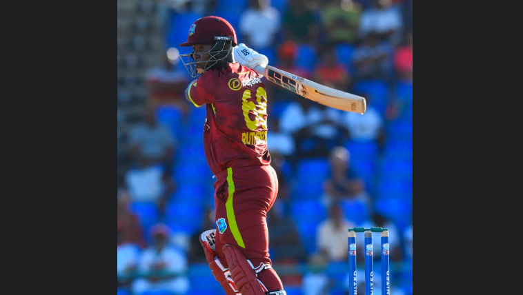 Sherfane Rutherford plays a shot against Bangladesh