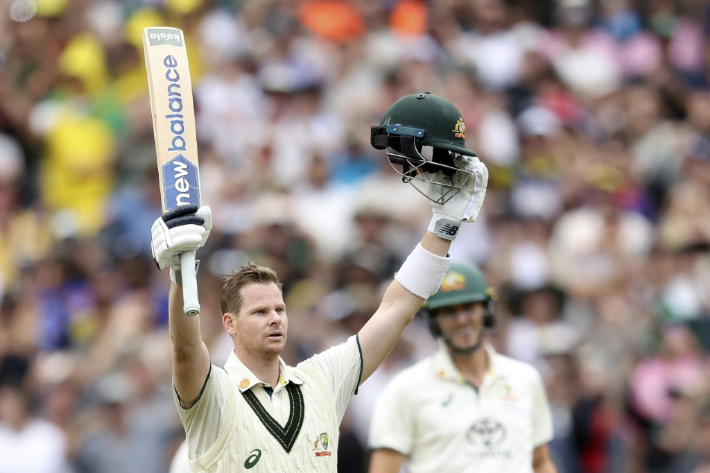 Australia's Steve Smith celebrates reaching his 34th Test century in the fourth Test against India, AFP