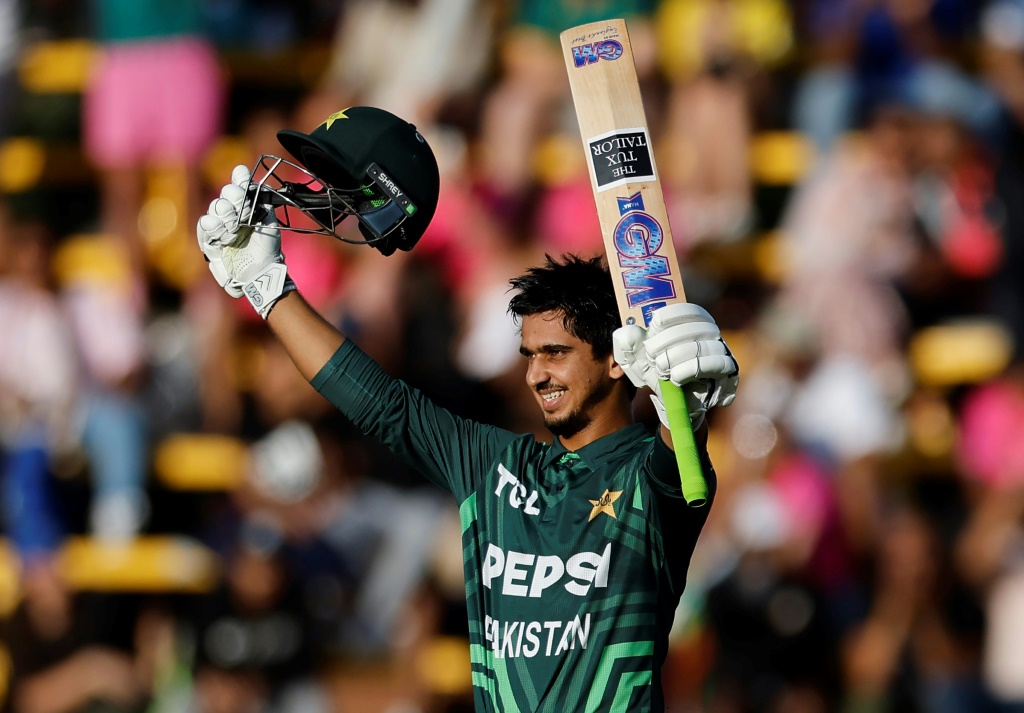 Century star: Pakistan's Saim Ayub celebrates after scoring a hundred in Sunday's win over South Africa, AFP