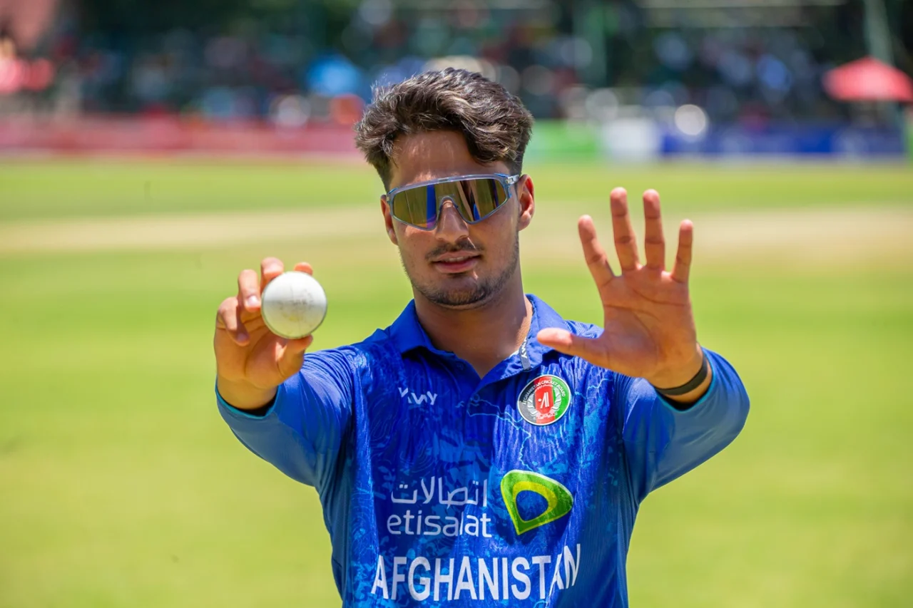 AM Ghazanfar holds up the match ball after his five-for, ACB