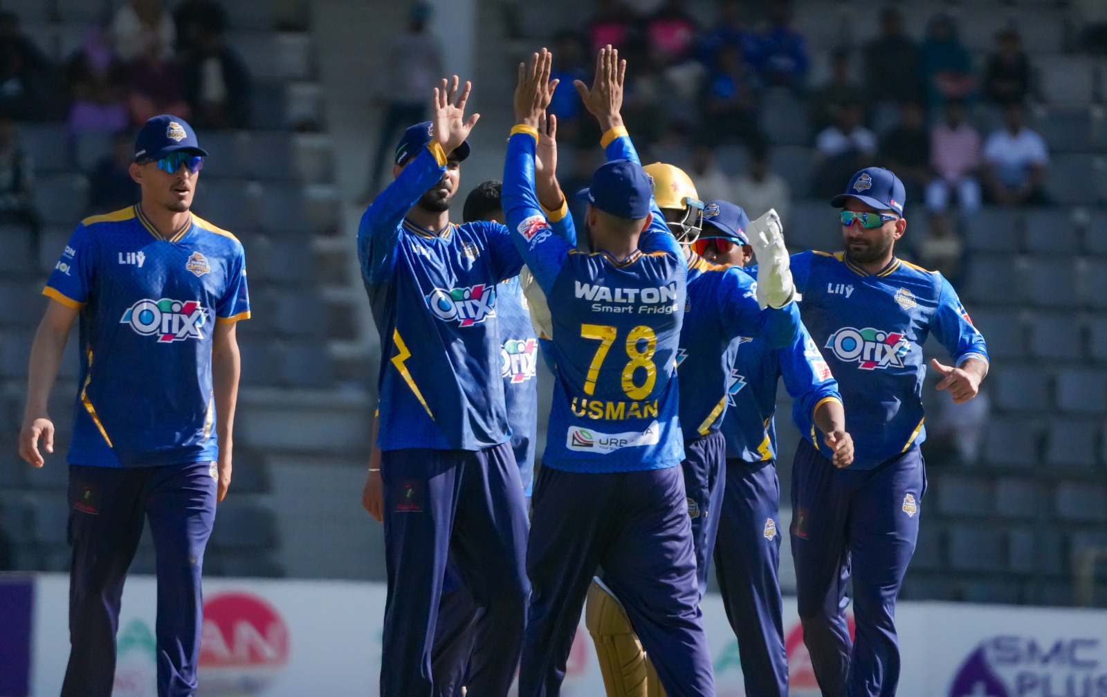 Dhaka Capitals celebrate a wicket