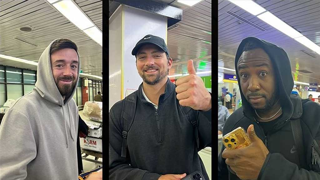 James Vince, Tim David and Andre Russell [L-R} at the airport on Monday morning