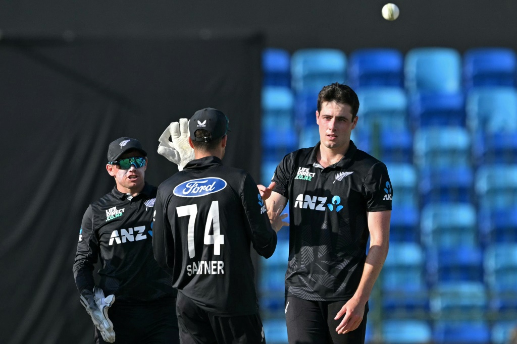 Key strikes: New Zealand's Will O’Rourke (R) celebrates after taking the wicket of Pakistan captain Mohammad Rizwan, AFP