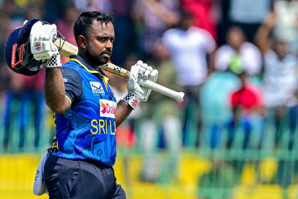 Sri Lanka's captain Charith Asalanka celebrates after scoring a century, AFP