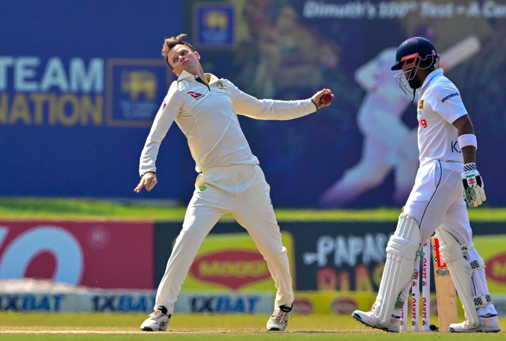 Australia's Matthew Kuhnemann (L) took 16 wickets in the series win over Sri Lanka which resulted in his action being reported, AFP