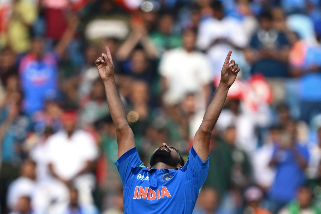 'Feel the pain': Mohammed Shami celebrates after taking the wicket of Taskin Ahmed, AFP