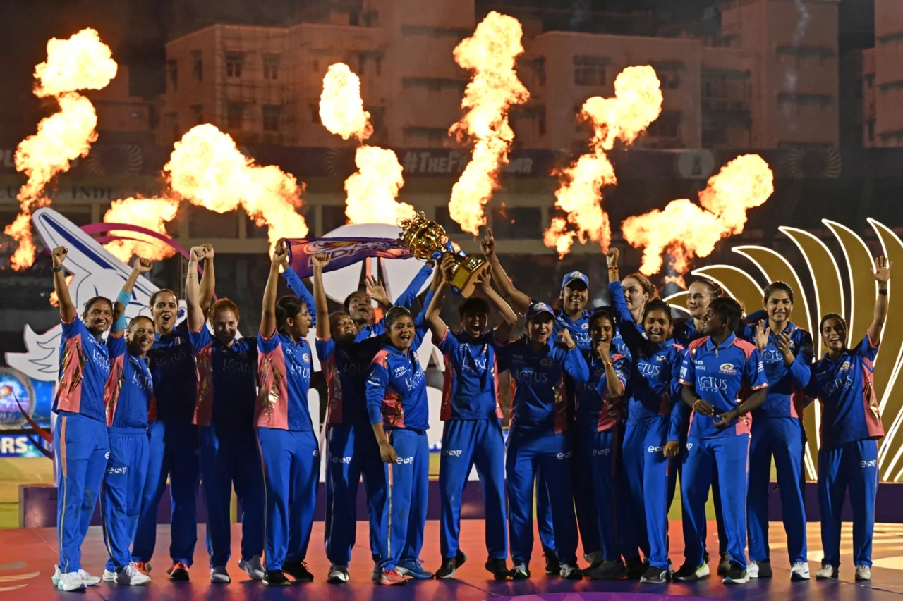 Mumbai Indians celebrate with the WPL trophy