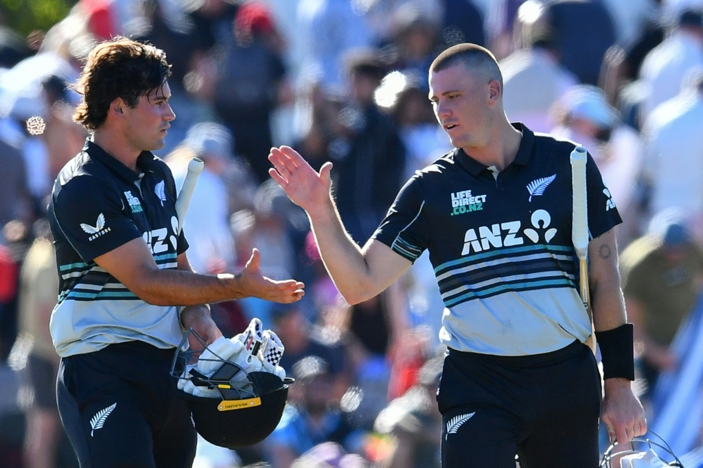 New Zealand's Finn Allen (right) and Tim Robinson celebrate the win against Pakistan, AFP