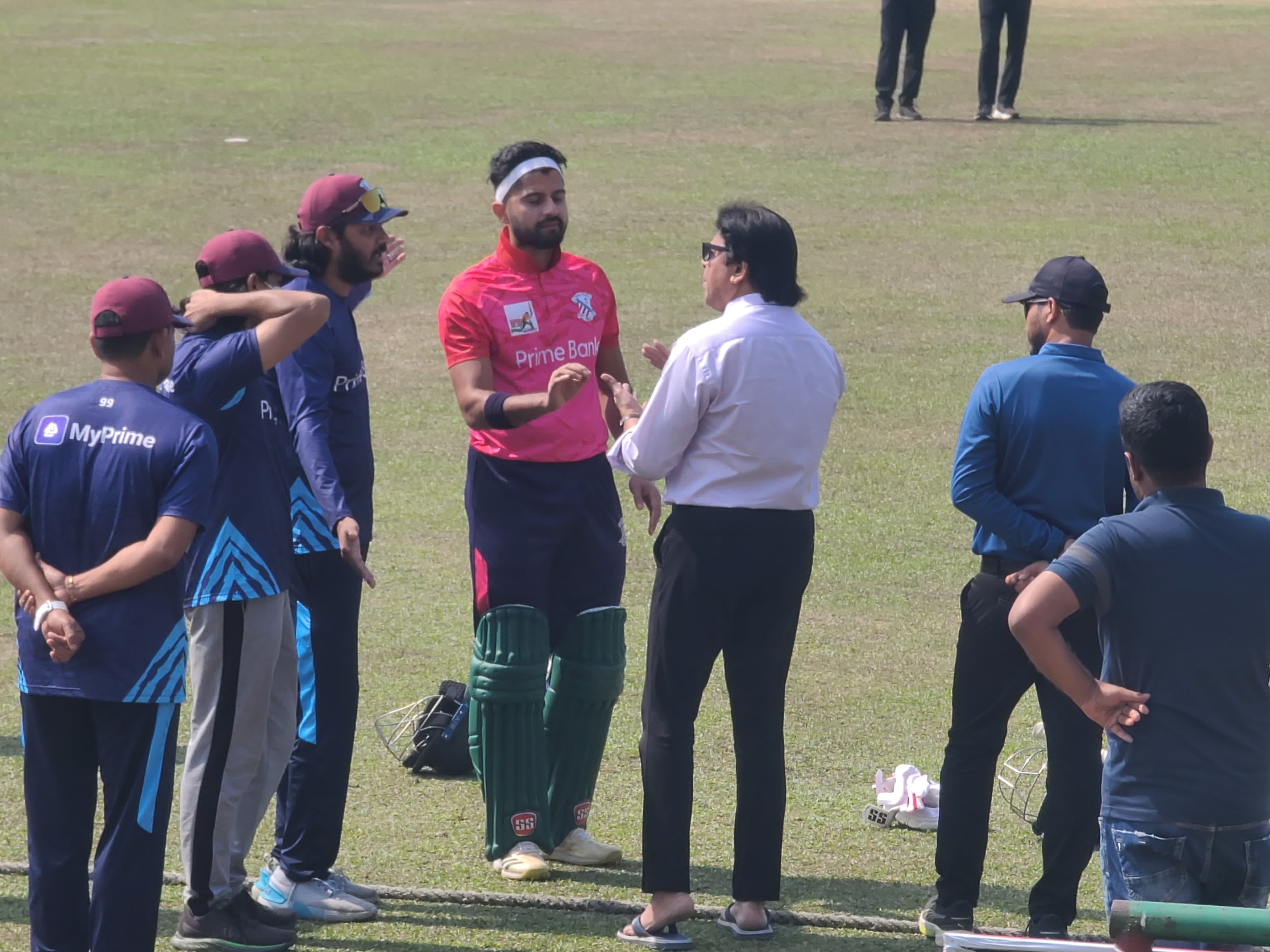 Prime Bank captain, coach, and manager in talks with match referee yesterday, Cricfrenzy