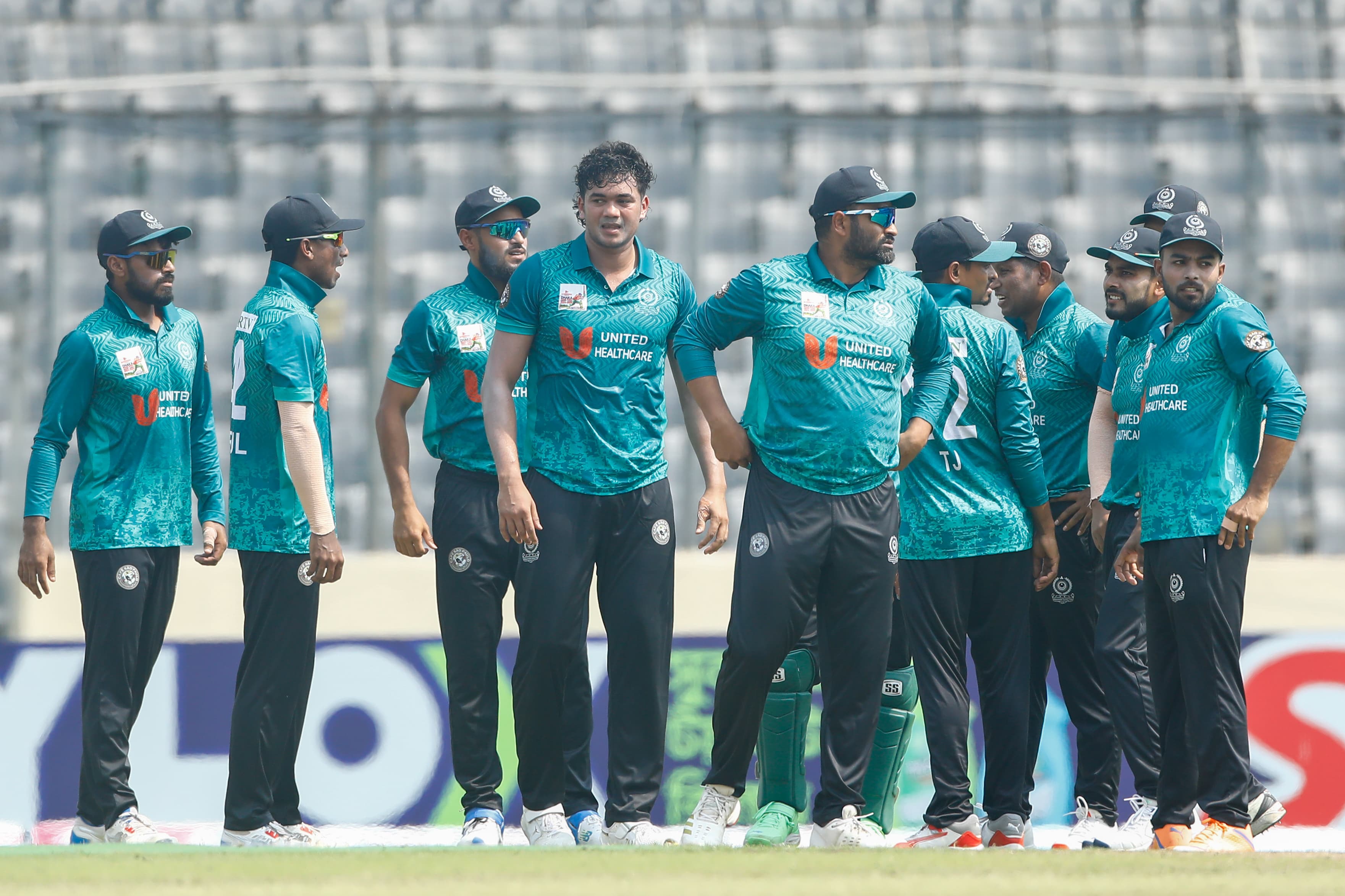 Mohammedan players celebrate a wicket, Cricfrenzy