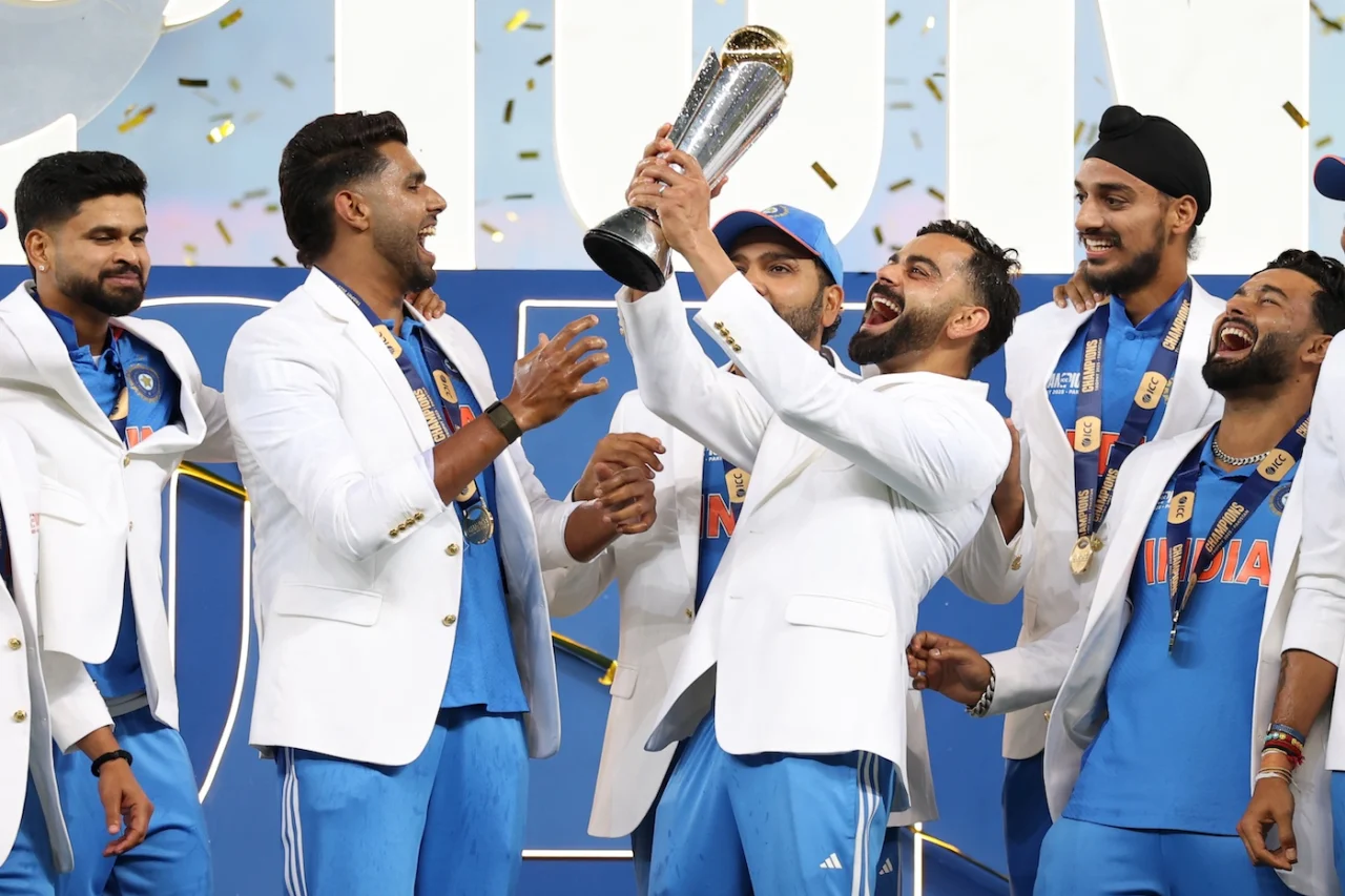 Virat Kohli holds the Champions Trophy aloft, ICC