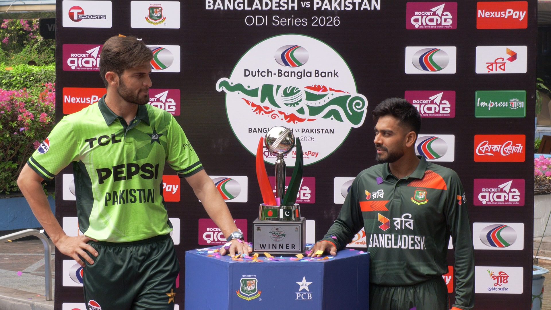 Two captains with the trophy