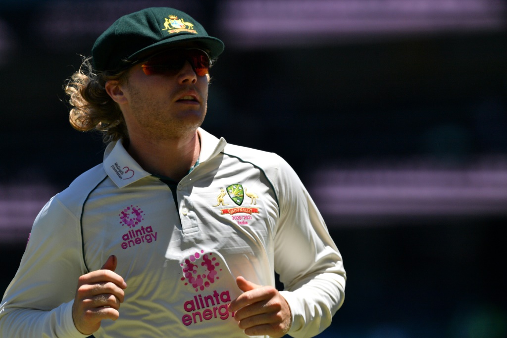 Australia's Will Pucovski fields during the fifth day of the third cricket Test match between Australia and India at the Sydney Cricket Ground (SCG) in Sydney on January 11, 2021, AFP