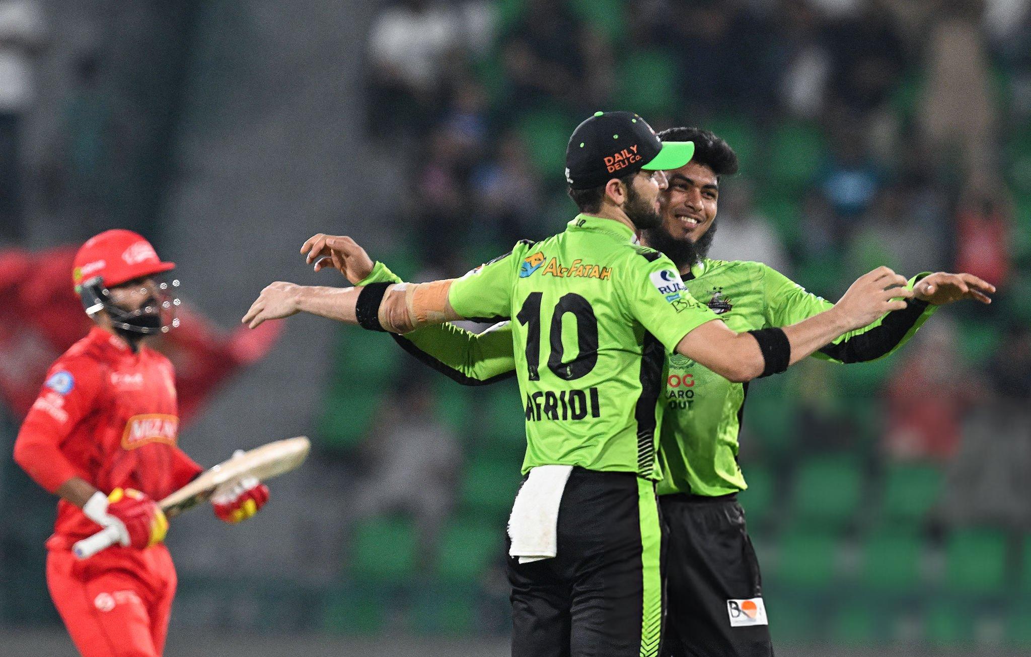 Rishad Hossain and Shaheen Afridi celebrate a wicket