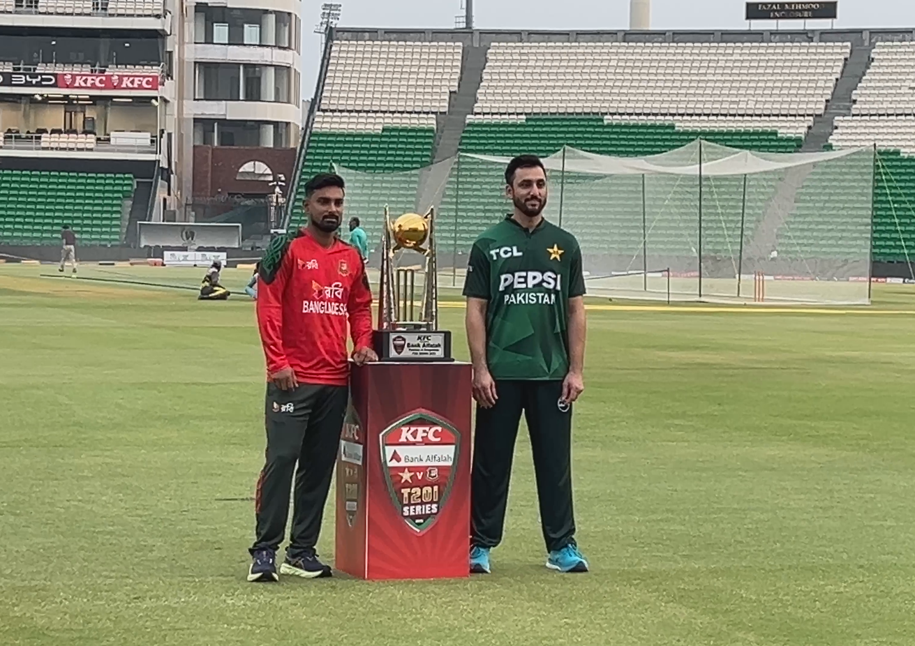 Two captains with the trophy