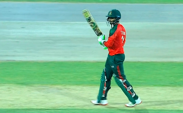 Tanzid Hasan Tamim hits a 50