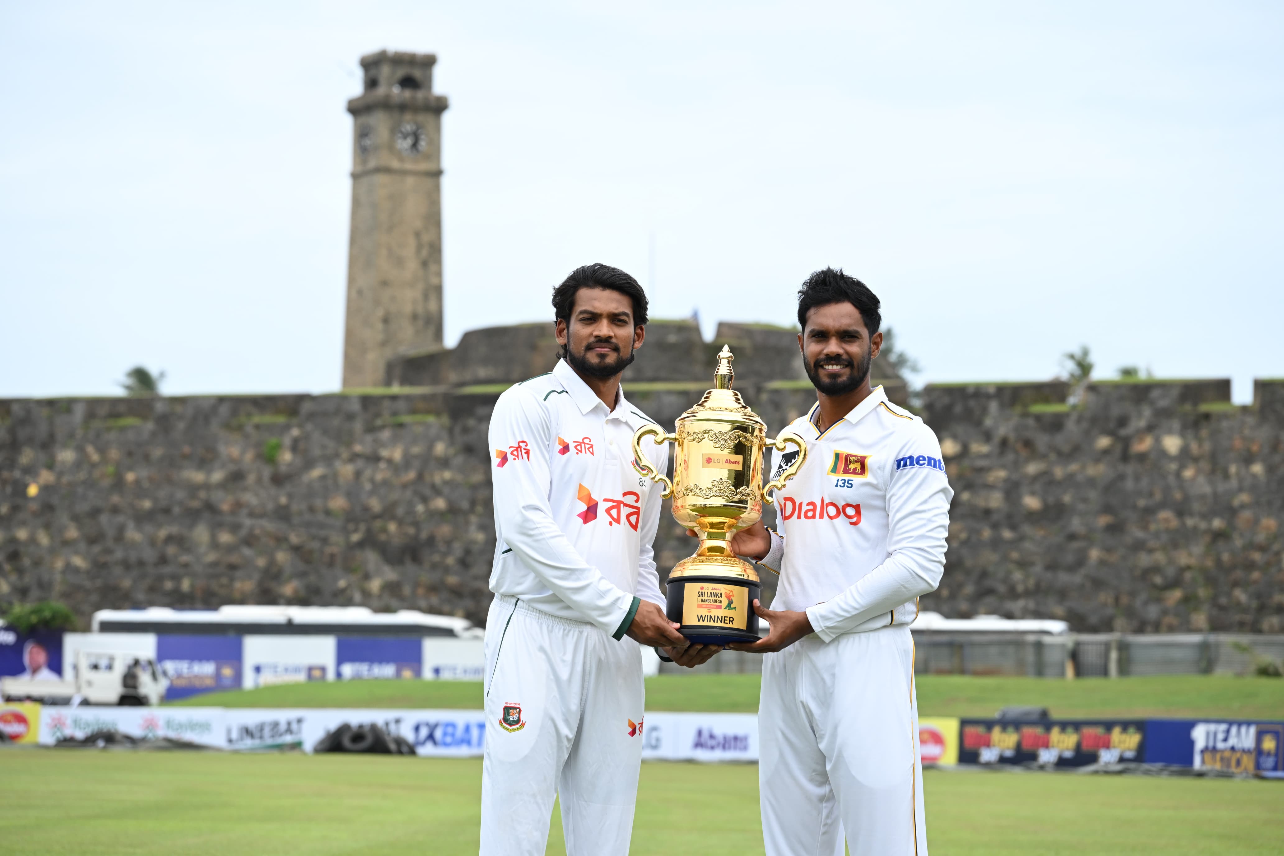 Two captains with the trophy