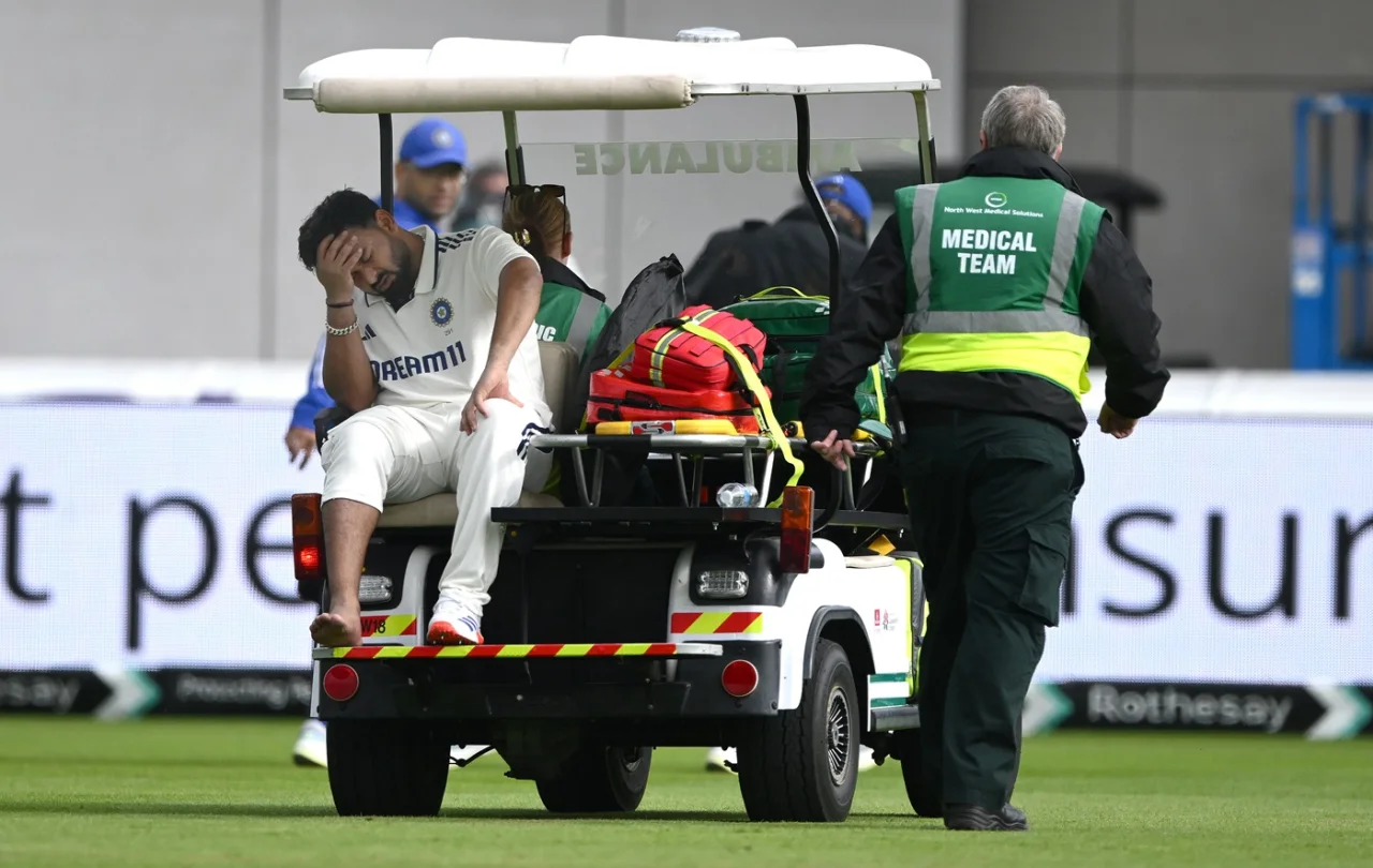 Rishabh Pant leaves the field on a medical cart after hurting his foot