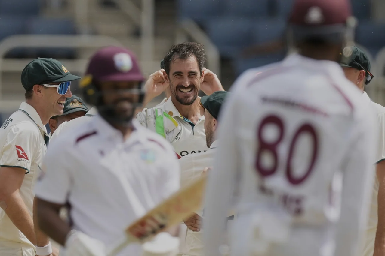 Mitchell Starc smiles with a Test record