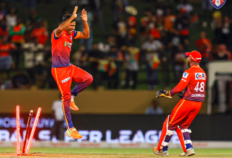 Kaleem Sana celebrates a wicket with the keeper