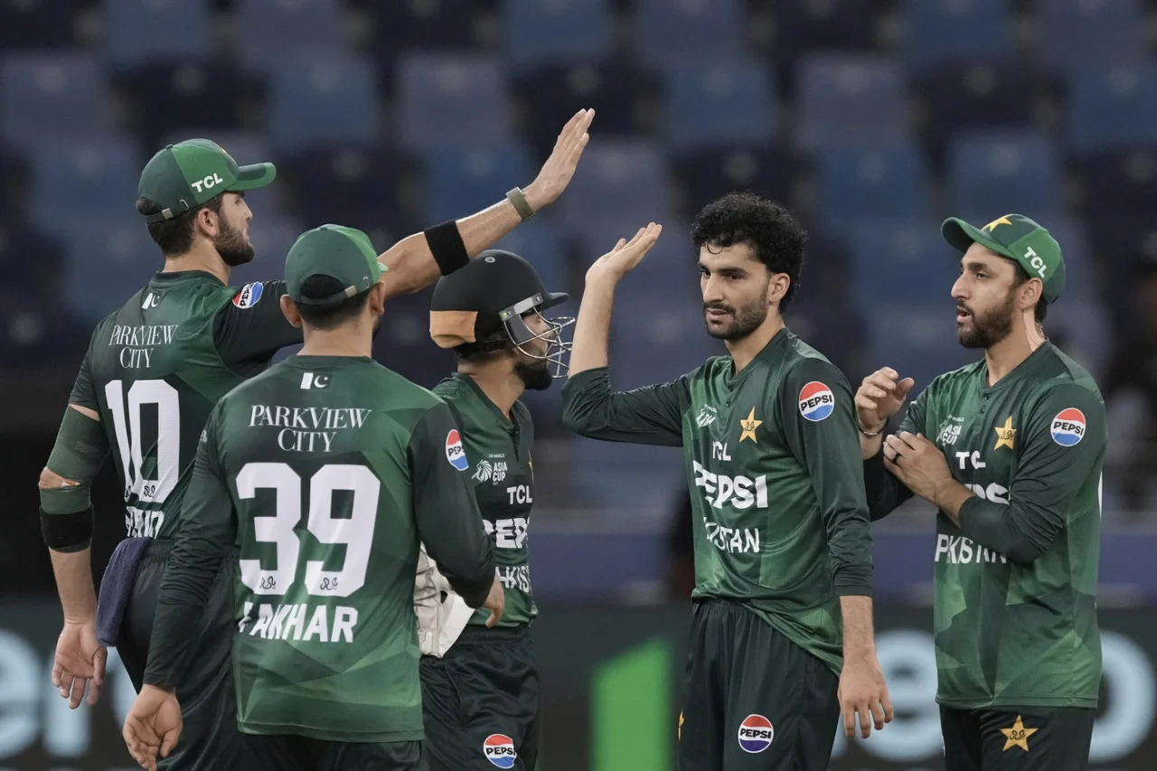 Sufiyan Muqeem celebrates a wicket with his teammates